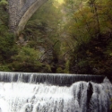 Waterfall under bridge