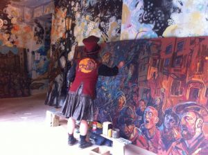 Chris Rutterford Painting a Mural